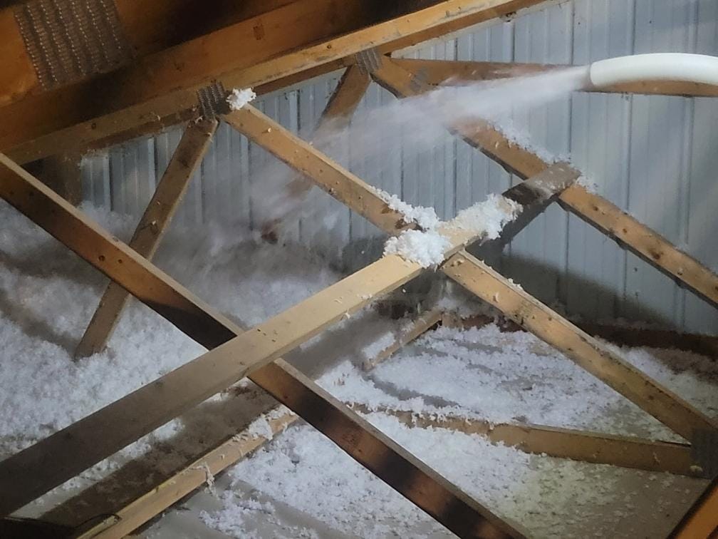 Attic insulation install